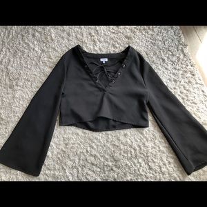 Tobi black long sleeved crop with front tie detail